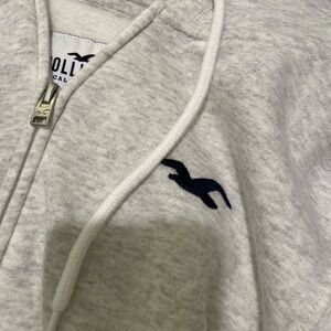 Women’s Light Heather Grey Hollister Full Zip Up Draw String Logo Hooded Sweater